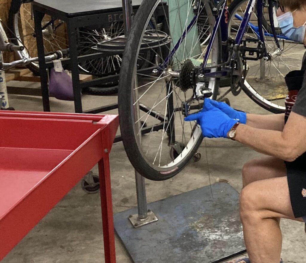 person working on gears